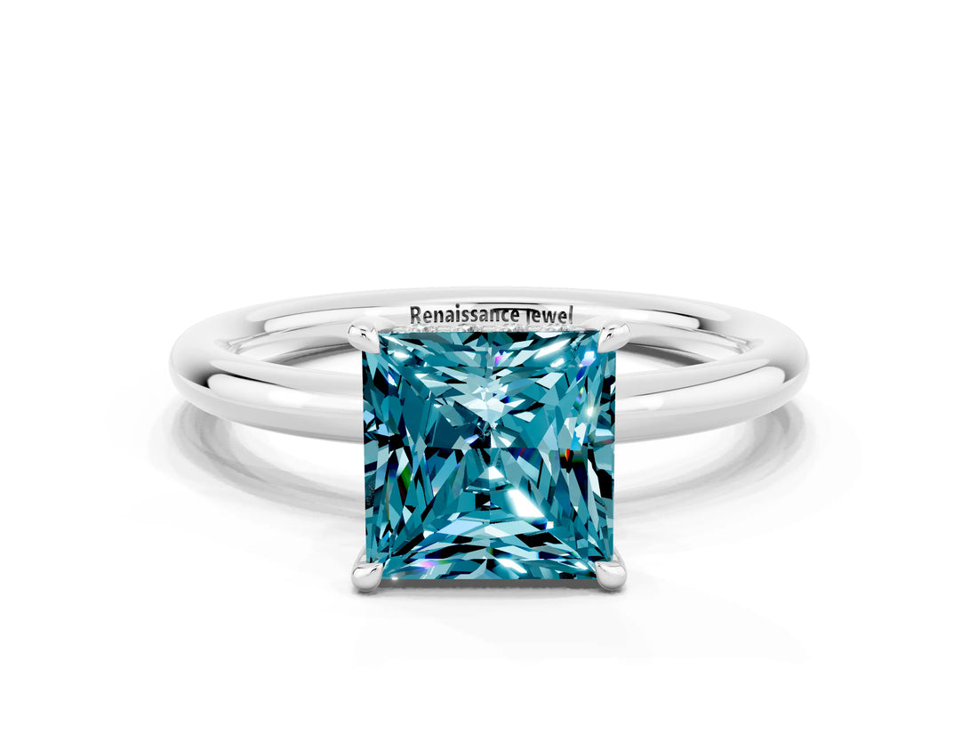 White gold Princess Cut Blue Topaz Solitaire Ring with Thin Band and Four-Prong Setting