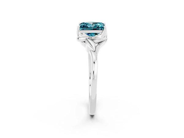 Platinum Princess Cut Blue Topaz Solitaire Ring with Twist Band and Four-Prong Setting
