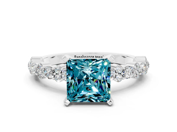 White gold Princess Cut Blue Topaz Side Stone Solitaire Ring with Round  and Four-Prong Setting