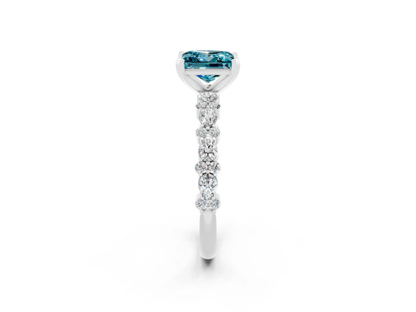 White gold Princess Cut Blue Topaz Side Stone Solitaire Ring with Round  and Four-Prong Setting