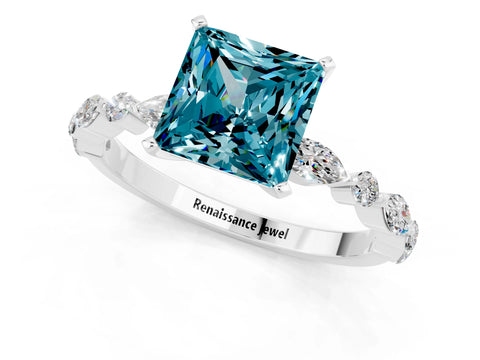 White gold Princess Cut Blue Topaz Solitaire with Side Stones on a Pavé Band and Four-Prong Setting_1