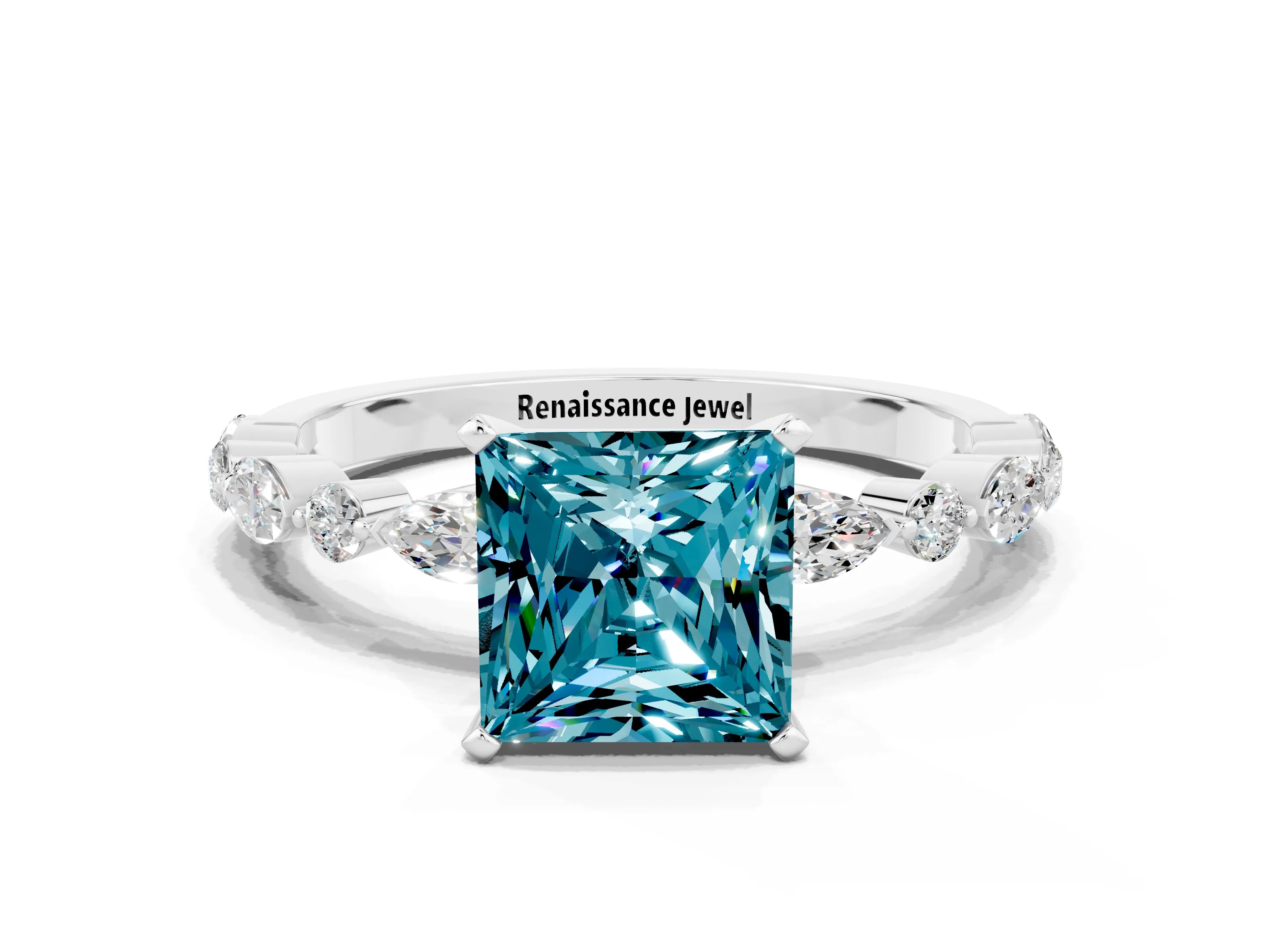 White gold Princess Cut Blue Topaz Solitaire with Side Stones on a Pavé Band and Four-Prong Setting