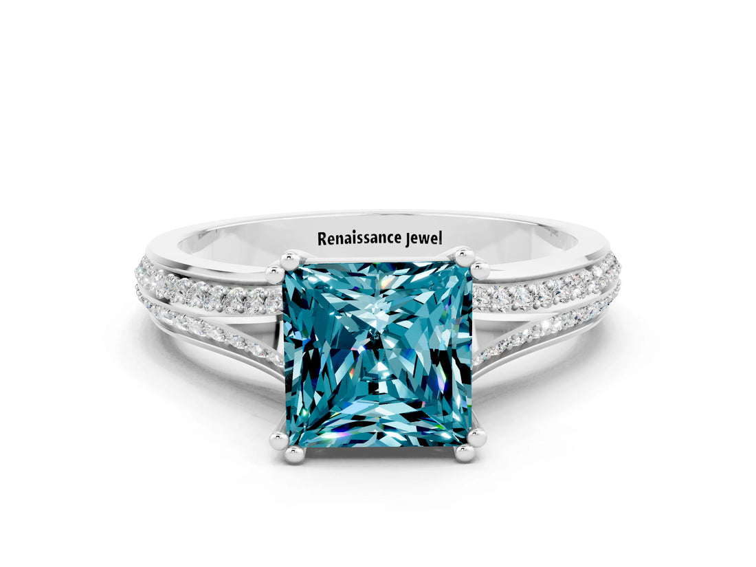 White gold Princess Cut Blue Topaz Split Shank Engagement Ring with Pavé Band