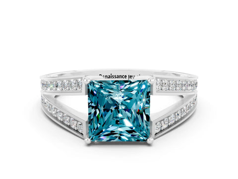White gold Princess Cut Blue Topaz Split Shank Ring with Pavé Band and Four-Prong Setting