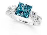 White gold Princess Cut Blue Topaz Three-Stone Ring with Pavé Split Shank and Four-Prong Setting_1
