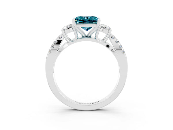 White gold Princess Cut Blue Topaz Three-Stone Ring with Pavé Split Shank and Four-Prong Setting