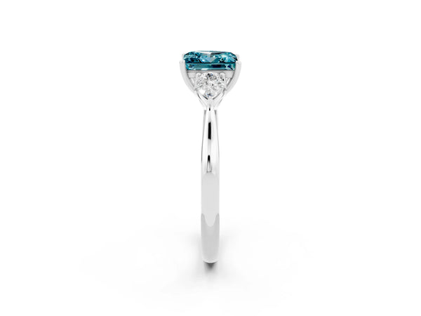 Platinum Princess Cut Blue Topaz Three-Stone Ring with Pear  Side Stones and Prong Setting