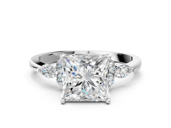 White gold Princess Cut Brilliant Diamond Solitaire Ring with Pear Side Stones and Four-Prong Setting