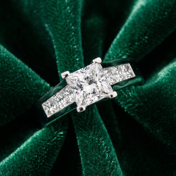 White gold Princess Cut Channel Set Solitaire Ring with Four-Prong Setting