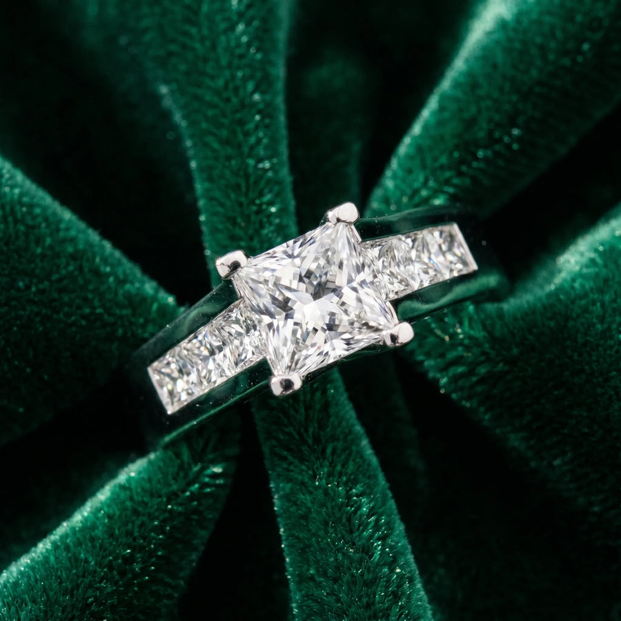 White gold Princess Cut Channel Set Solitaire Ring with Four-Prong Setting