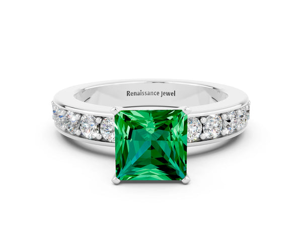 Platinum Princess Cut Emerald Engagement Ring with Channel Set Round Band and Prong Setting