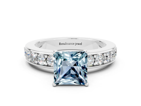 Platinum Princess Cut Aquamarine Engagement Ring with Channel Set Round Band and Prong Setting