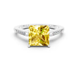 White gold Princess Cut Cut Channel Set Solitaire Engagement Ring with Four-Prong Setting