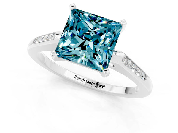 White gold Princess Cut Blue Topaz Solitaire Ring with Channel Set Round Band and Prong Setting