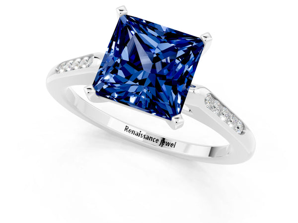 White gold Princess Cut Blue Sapphire Solitaire Ring with Channel Set Round Band and Prong Setting