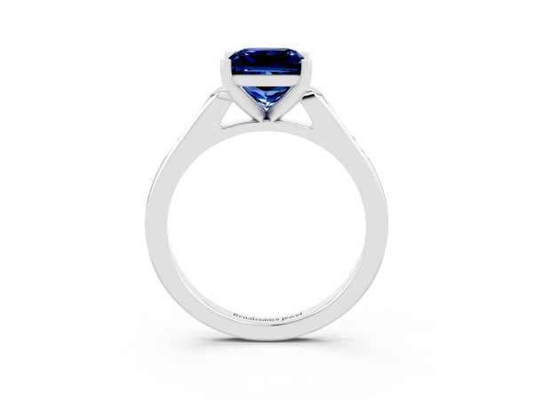 White gold Princess Cut Blue Sapphire Solitaire Ring with Channel Set Round Band and Prong Setting