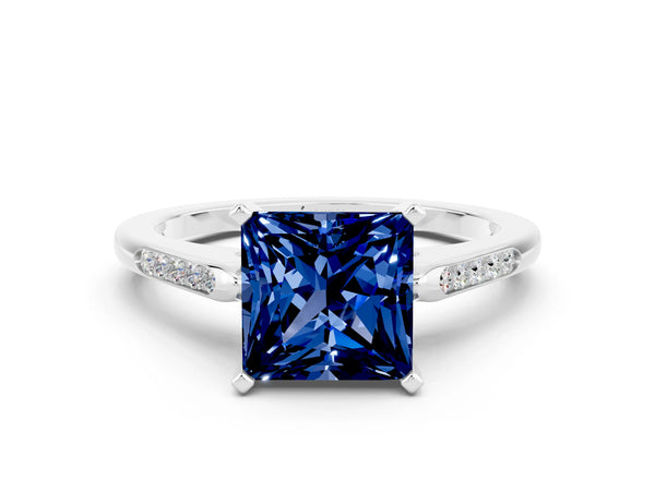 Silver Princess Cut Blue Sapphire Solitaire Ring with Channel Set Round Band and Prong Setting