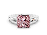 White gold Princess Cut Cut Diamond Ring with Tapered Baguette Side Stones in Four-Prong Setting