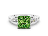 White gold Princess Cut Cut Diamond Ring with Tapered Baguette Side Stones in Four-Prong Setting