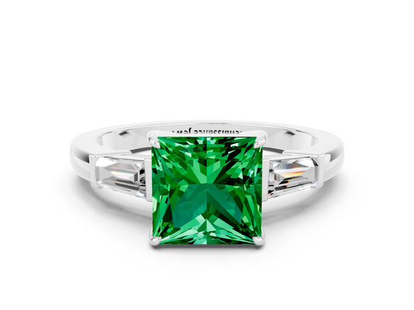 Platinum Princess Cut Emerald Three-Stone Ring with Tapered Baguette Side Stones and Prong Setting
