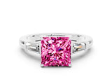White gold Princess Cut Cut Diamond Ring with Tapered Baguette Side Stones in Four-Prong Setting