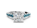 White gold Princess Cut Diamond Cathedral Solitaire Ring with Round with Blue Topaz side stone Pavé Band