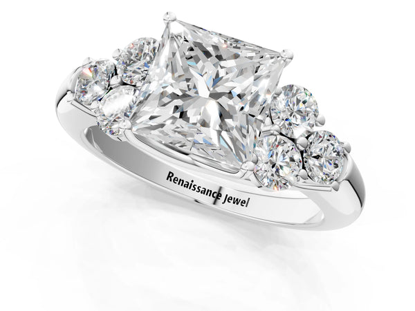 Platinum Princess Cut Diamond Cluster Ring with Round Accent Stones and Prong Setting on a Classic Band
