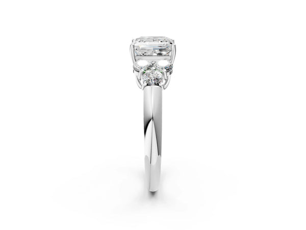 Platinum Princess Cut Diamond Cluster Ring with Round Accent Stones and Prong Setting on a Classic Band