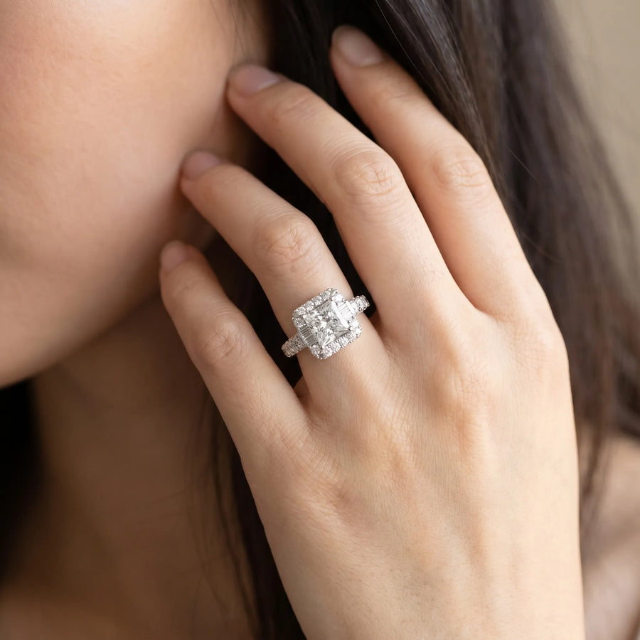 White gold Princess Cut Diamond Halo Engagement Ring with Baguette Accents and Pavé Band
