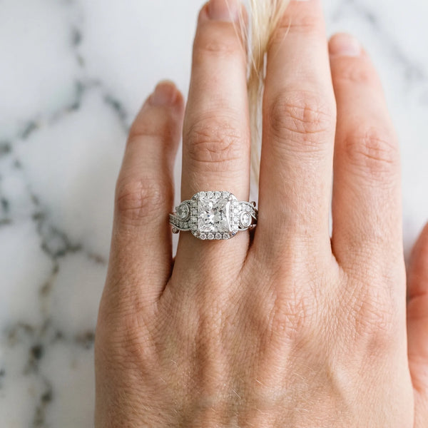 White gold Princess Cut Diamond Halo Ring with Milgrain Pavé Band and Four-Prong Setting