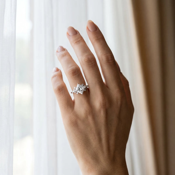 White gold Princess Cut Diamond Ring with Side Stones and Four-Prong Setting