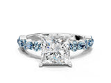 White gold Princess Cut Diamond Side Stone Solitaire Ring with Round with Aquamarine side stone and Four-Prong Setting