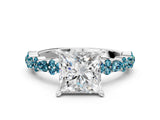 White gold Princess Cut Diamond Side Stone Solitaire Ring with Round with Blue Topaz side stone and Four-Prong Setting
