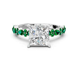 White gold Princess Cut Diamond Side Stone Solitaire Ring with Round with Emerald side stone and Four-Prong Setting