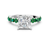White gold Princess Cut Diamond Side Stone Solitaire Ring with Round with Emerald side stone and Four-Prong Setting