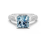White gold Princess Cut Diamond Solitaire Engagement Ring with Pavé Band and Four-Prong Setting