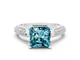 White gold Princess Cut Diamond Solitaire Engagement Ring with Pavé Band and Four-Prong Setting