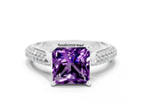 White gold Princess Cut Diamond Solitaire Engagement Ring with Pavé Band and Four-Prong Setting