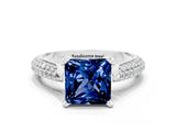 White gold Princess Cut Diamond Solitaire Engagement Ring with Pavé Band and Four-Prong Setting