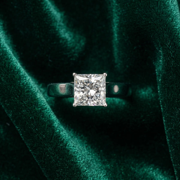 White gold Princess Cut Diamond Solitaire Engagement Ring with Tapered Plain Band and Four-Prong Setting