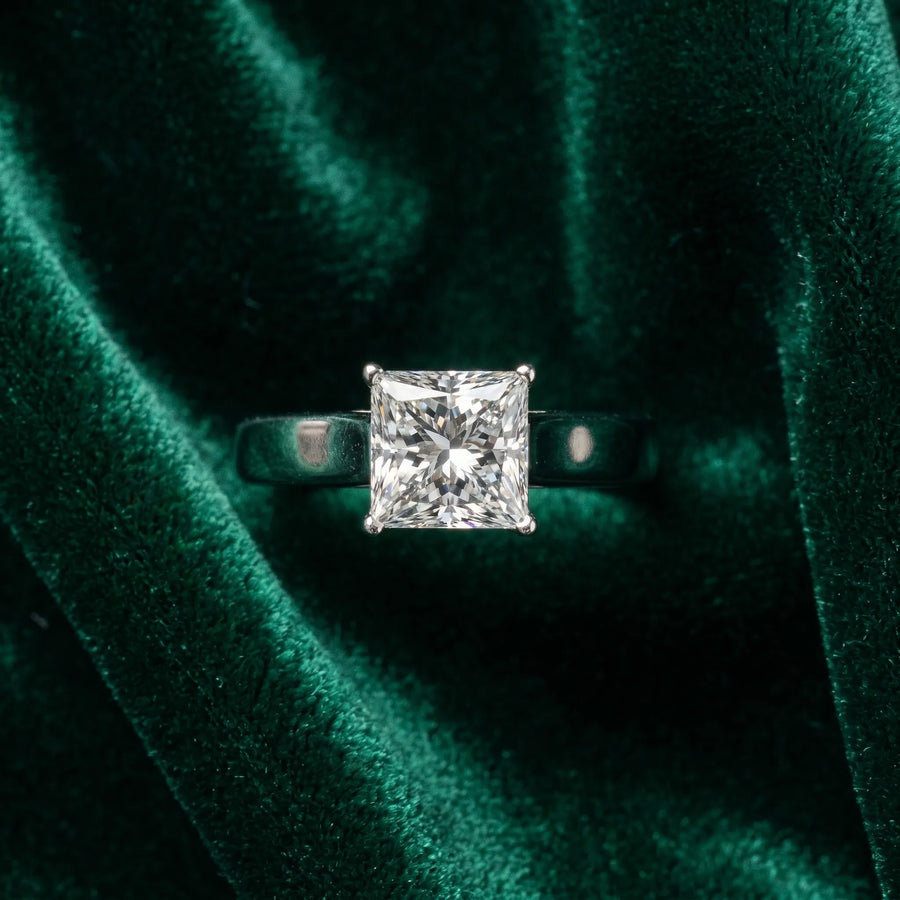 White gold Princess Cut Diamond Solitaire Engagement Ring with Tapered Plain Band and Four-Prong Setting