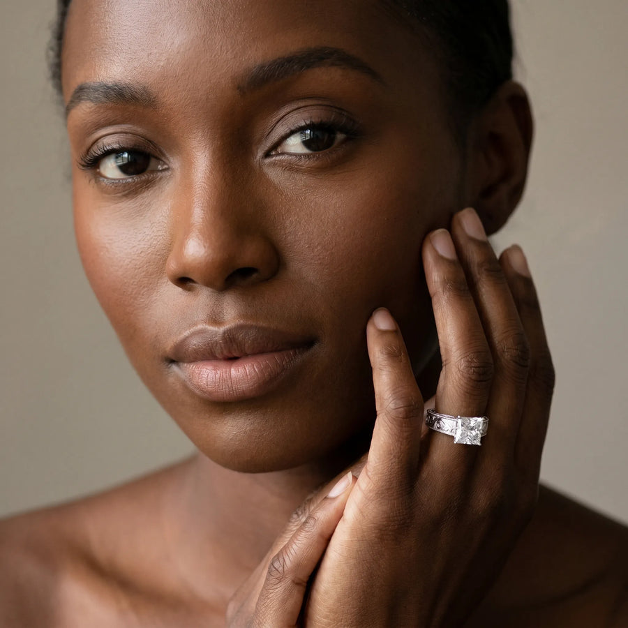 White gold Princess Cut Diamond Solitaire Ring with Engraved Band and Four-Prong Setting