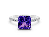 White gold Princess Cut Diamond Solitaire Ring with Four-Prong Setting and Pavé Band