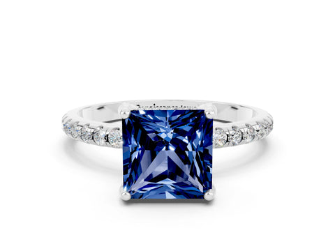 White gold Princess Cut Diamond Solitaire Ring with Four-Prong Setting and Pavé Band