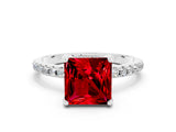 White gold Princess Cut Diamond Solitaire Ring with Four-Prong Setting and Pavé Band