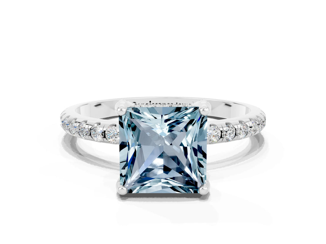 White gold Princess Cut Diamond Solitaire Ring with Four-Prong Setting and Pavé Band