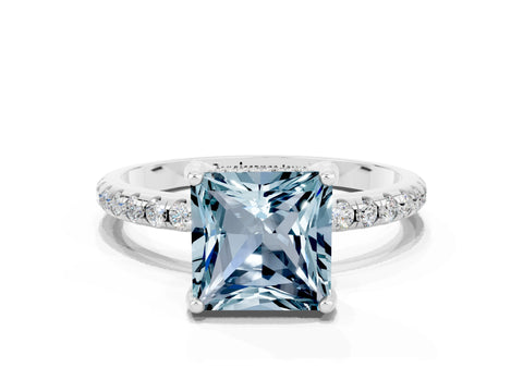 White gold Princess Cut Diamond Solitaire Ring with Four-Prong Setting and Pavé Band