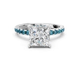 White gold Princess Cut Diamond Solitaire Ring with Round with Blue Topaz side stone Pavé Band and Four-Prong Setting