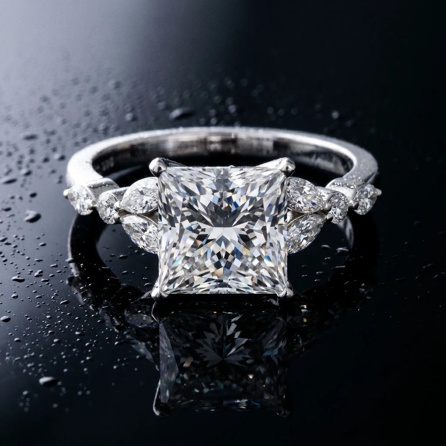 White gold Princess Cut Diamond Solitaire Ring with Side Stones and Four-Prong Setting