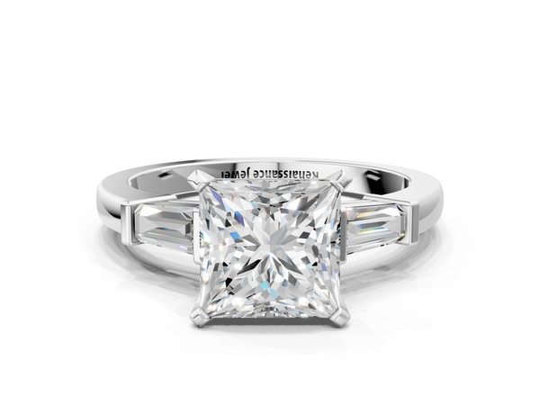 White gold Princess Cut Diamond Solitaire Ring with Tapered Baguette Accents and Four-Prong Setting
